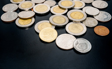 Thai coins isolated on black
