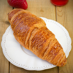 croissant on the plate with strawberry