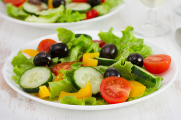 vegetable salad on the plates