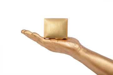 Man's golden hand holding box