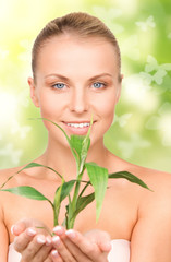 woman with sprout and butterflies