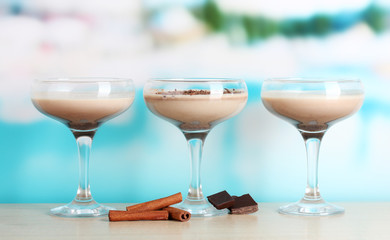 Cream cocktails on brightblue background