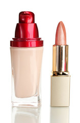 Beautiful lipstick and foundation, isolated on white