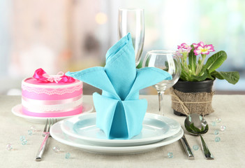 Romantic table serving on bright background