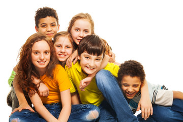 Fototapeta premium Group of hugging and laughing kids