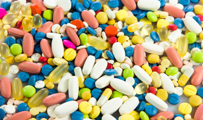 background made of colorful pills.