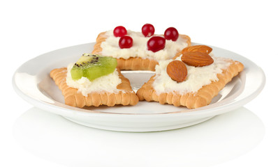 Obraz na płótnie Canvas Tasty canapes with cheese, kiwi and cranberry, almond,