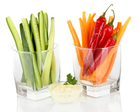 Assorted raw vegetables sticks isolated on white