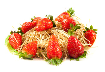 Strawberries with leaves. Isolated on a white background.