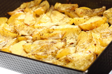 Roasted potatoes with spices and cheese