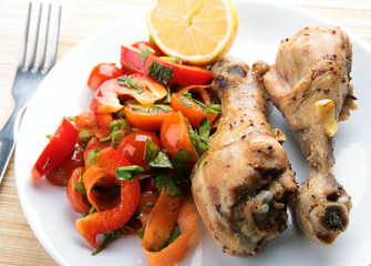 Grilled chicken legs with vegetable salad