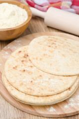 wheat tortillas on a wooden board