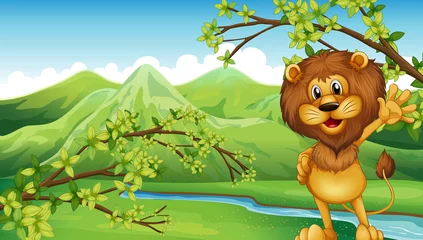 Photo sur Plexiglas Animaux de la forêt Un lion devant la rivière et les hautes montagnes