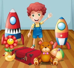 Türaufkleber Ein kleiner Junge mit seinen Spielsachen im Zimmer © GraphicsRF