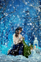 Fototapeta na wymiar Beauty woman in winter forest