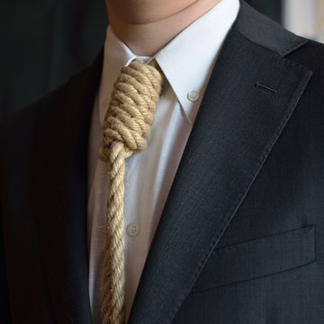 Portrait of man with loop tie