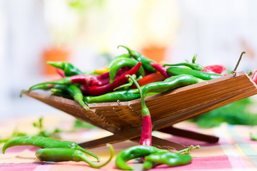 red and green peppers in a bowl