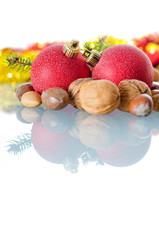Fototapeta na wymiar christmas background with nuts and decorations