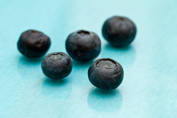 blueberries on a blue background