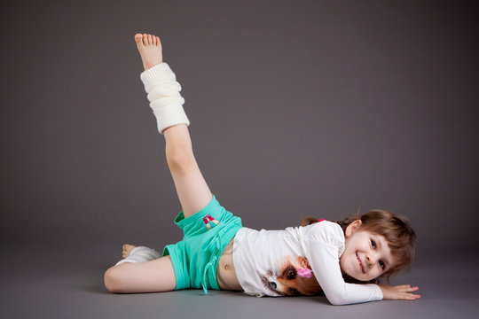 little girl on gray background