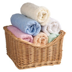 Fototapeta na wymiar Fluffy towels in a basket.