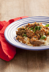 African maize porridge, known as pap,with chicken livers