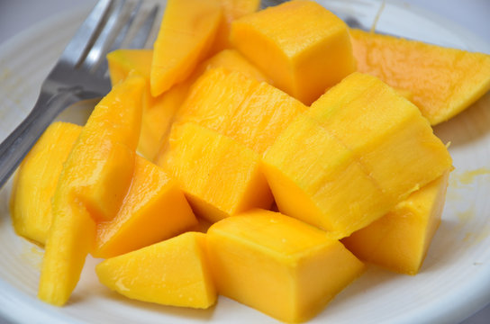 Mango on white dish