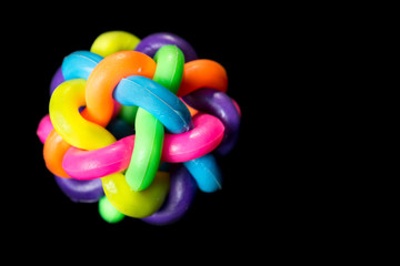 ball of multi-colored rubber thread isolated