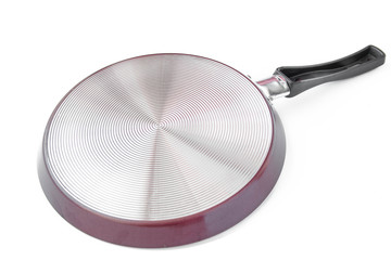 Underside of frying pan on white