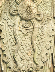 Closed up texture on stutue in wat pho