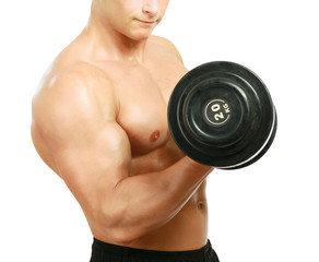 Fototapeta na wymiar Handsome muscular man working out with
