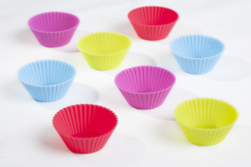 The image is a groups of cupcake molds