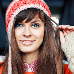 Outdoor closeup portrait of young girl in winter or cold spring