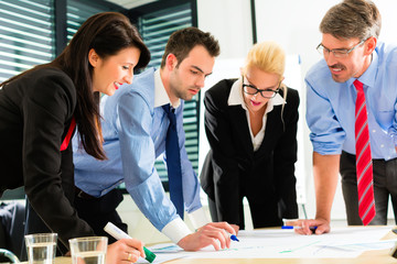 Business - People in office working as team