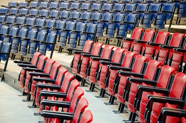 Fototapeta premium Conference room full of blue and red seats
