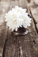 White Flowers on the Wooden Table