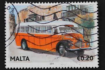 Malta 2011: stamp shows classic yellow Maltese bus