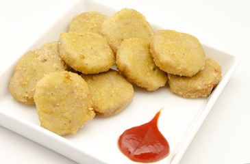 Aperitivo de pollo empanado