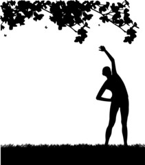 Pretty girl exercising in spring outdoors in park silhouette