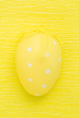 Close up on yellow easter egg