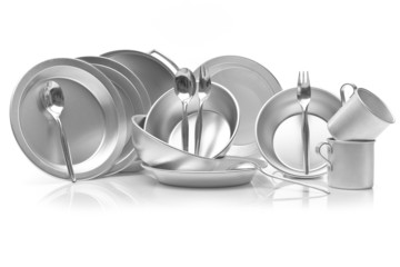 Set of metal dishes on white background