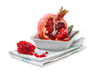 Ripe pomegranates  on a white background.