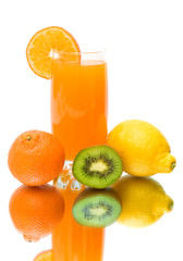 fruit and glass of juice on a white background