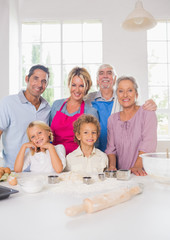 Smiling family preparing to cook