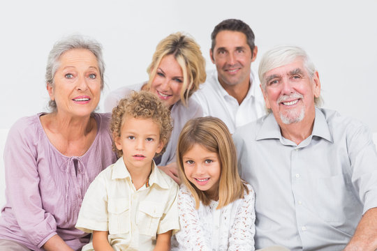 Familly Sitting And Posing