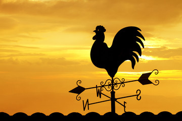 Weather Vane in Colorful Sky