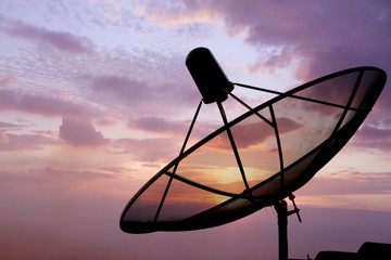 Satellite dish in morning sky