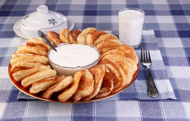Fritters with sour cream
