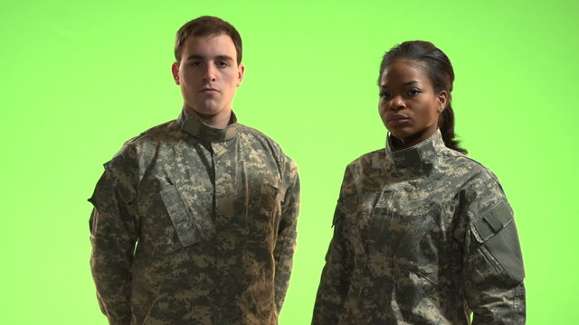 Soldiers in front of green screen