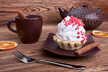 cake and tea with cinnamon